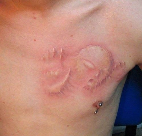 24 татуировки с невероятными оптическими иллюзиями 13