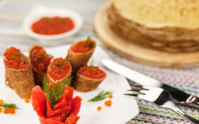 Масниця: традиції наших предків traditional Russian pancakes with red cavier and honey