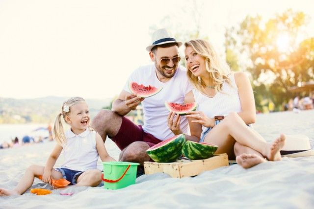 Family enjoying beach