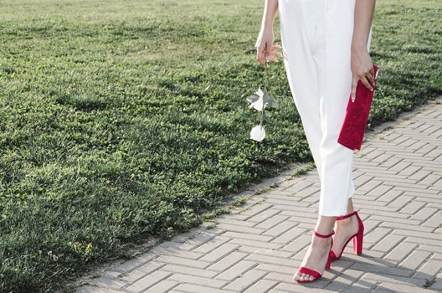 Мода 2019. Літні брюки elegant female legs in high heels and jumpsuit