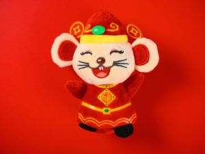 rat mascot as a traditional character named the God of Wealth on red background the Chinese means fortune